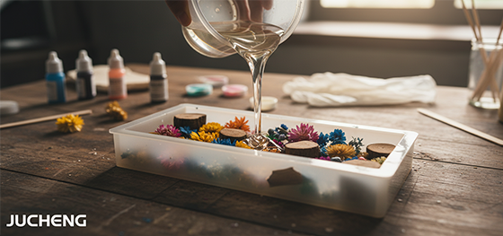 artist pouring clear epoxy resin artist pouring clear epoxy resin
