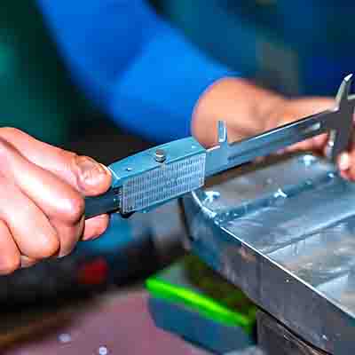 Measure the part with a caliper Measure the part with a caliper