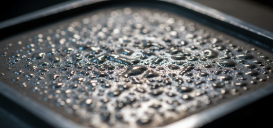 blistering defects caused by trapped air during thermal heat treatment