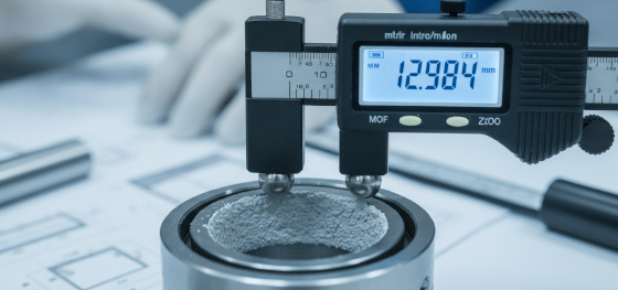 Digital internal micrometer measuring the shrunken inner diameter of a chemically coated bearing housing Digital internal micrometer measuring the shrunken inner diameter of a chemically coated bearing housing